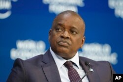 FILE - Botswana's President Mokgweetsi Masisi attends the World Economic Forum in Davos, Switzerland, Jan. 21, 2020.