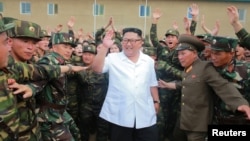 North Korea leader Kim Jong Un inspects Unit 1524 of the Korean People's Army in this undated photo released by North Korea's Korean Central News Agency, June 30, 2018.