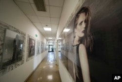 A view of the corridor at the Cose di Maglia factory where the D. Exterior brand is produced, in Brescia, Italy on June 14, 2022. (AP Photo/Luca Bruno)