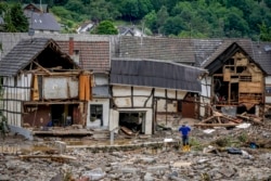 FILE - This Thursday, July 15, 2021 file photo shows destroyed houses in Schuld, Germany