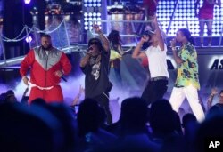 DJ Khaled, from left, Lil Wayne, Chance The Rapper, and Quavo perform "I'm the One" at the BET Awards at the Microsoft Theater, June 25, 2017, in Los Angeles.