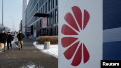 Logo of Huawei is seen on the advert in front of the local offices of Huawei in Warsaw, Poland, Jan. 11, 2019. 