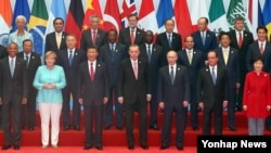 Xalqaro hamjamiyat yetakchilari Xitoyda o'tgan Katta yigirmalik sammitida, 4-sentabr, 2016-yil.