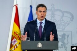 Spain's Prime Minister Pedro Sanchez delivers a statement at the Moncloa Palace in Madrid, Feb. 4, 2019.Sanchez told reporters "we are working for the return of full democracy in Venezuela."