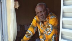 FILE - Clement Abaifouta, the head of an association of victims of former Chadian dictator Hissene Habre, poses for a picture at his home in Ndjamena, Chad, July 11, 2015.