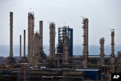 FILE - A petrochemical complex in the South Pars gas field is seen in Asalouyeh, Iran, on the northern coast of Persian Gulf, Nov. 19, 2015.