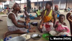People displaced by flooding are seen at Bangula evacuation camp, in Nsanje, Malawi, March 12, 2019.
