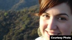 Giovanna Tolda, 30, of Northampton, Massachusetts, moved back in with her parents while completing a master's degree program. (Photo by Phoebe Zimmerman)