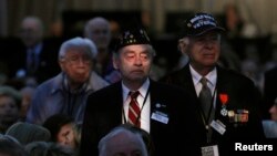 یک قربانی هولوکاست در مراسم بزرگداشت روز هولوکاست در موزه یادبود قربانیان هولوکاست در واشنگتن، پایتخت آمریکا. 