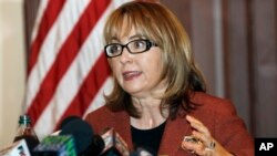 FILE - Former U.S. Rep. Gabrielle Giffords of Arizona, who co-founded the gun control group Americans for Responsible Solutions with her husband, delivers a speech in Trenton, N.J., March 18, 2015.