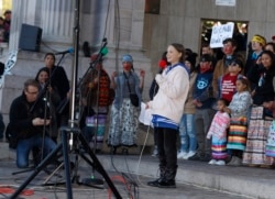 Swedish climate activist Greta Thunberg speaks to several thousand people at a climate strike rally at Denver's Civic Center Park, Friday, Oct. 11, 2019. (AP Photo/David Zalubowski)