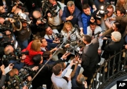 Virginia Lt. Gov. Justin Fairfax, center right, speaks to the media in the rotunda of the Capitol in Richmond, Virginia, Feb. 4, 2019.