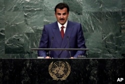 FILE - Emir of Qatar Sheikh Tamim bin Hamad Al-Thani addresses the United Nations General Assembly, Sept. 20, 2016, in New York.