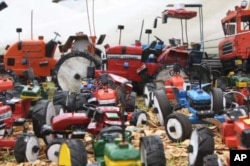 Just a few of the many toy vehicles Munyuki makes from scrap that he collects all over southern Africa