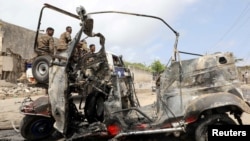 A wreckage of a rickshaw is seen at the scene of a car explosion near Banadir hospital in Mogadishu, Somalia, July 10, 2021.