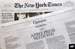 An editorial titled "A Free Press Needs You" is published in The New York Times, Aug. 16, 2018, in New York. Newspapers from Maine to Hawaii pushed back against President Donald Trump's attacks on "fake news" Thursday with a coordinated series of editorials speaking up for a free and vigorous press.