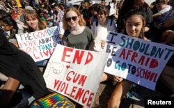 Students who walked out of their Montgomery County, Maryland, schools protest against gun violence in front of the White House in Washington, Feb. 21, 2018.