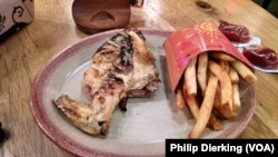 A Portuguese chicken meal at Nando's Peri-Peri restaurant. Nando's restaurants are growing in the United States.