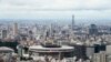 Clouds cover the sky over the Olympic Stadium at the eve of the end of the 2020 Summer Olympics, Aug. 7, 2021, in Tokyo, Japan. 