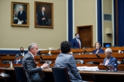 Dr. Rick Bright, former director of the Biomedical Advanced Research and Development Authority, testifies before a House panel on the coronavirus pandemic, on Capitol Hill in Washington, May 14, 2020.