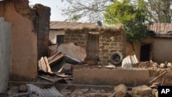 A house is left burned following an attack by gunmen in Bokkos, Nigeria, on Dec. 26, 2023. Nigerian officials and survivors say at least 140 people were killed by gunmen who attacked remote villages in north-central Nigeria's Plateau state.