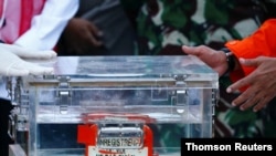 The retrieved "black box" from crashed Sriwijaya Air Plane is being transported to Jakarta's port.