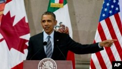 រូបឯកសារ៖ លោក​ប្រធានាធិបតី​អាមេរិក បារ៉ាក់ អូបាម៉ា ថ្លែង​នៅក្នុង​សន្និសីទ​សារព័ត៌មាន​នៅ​ឯ​ជំនួប​កំពូល​ក្នុង​ប្រទេស​ម៉ិកស៊ិក​ កាល​ពី​ឆ្នាំ២០១៤។