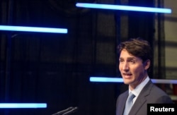 Canada's Prime Minister Justin Trudeau answers questions from the media in Montreal, Quebec, Aug. 8, 2018.
