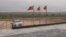 Chinese flags flutter atop the coal-mining site in Islamkot, Tharparkar district, Pakistan.