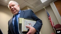 Russia's ambassador to the U.S. Sergey Kislyak, speaks with reporters in Washington. 