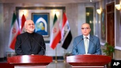 រូបឯកសារ៖ រដ្ឋមន្រ្តីក្រសួងការបរទេសអ៊ីរ៉ង់លោក Mohammed Javad Zarif (ខាងឆ្វេង) ធ្វើសន្និសីទសារព័ត៌មានជាមួយរដ្ឋមន្រ្តីការបរទេសអ៊ីរ៉ាក់ នៅក្រុងបាកដាដ កាលពីថ្ងៃទី២៦ ខែឧសភា ឆ្នាំ២០១៩។ 