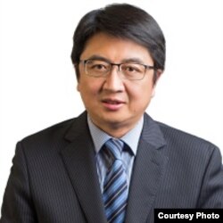 美国西东大学外交与国际关系学院副教授汪铮