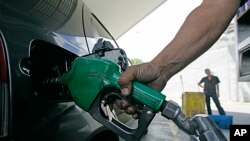 FILE - A Venezuelan gasoline station.