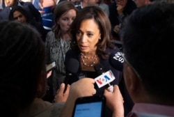 Democratic presidential hopeful Kamala Harris speaks in the Spin Room after the second Democratic primary debate of the 2020 presidential campaign season in Miami, June 27, 2019.