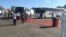 Buses carrying Malawian migrant workers from South Africa arrive at Mwanza Border in southern Malawi. (Courtesy of Pasqually Zulu, Mwanza Border Immigration)