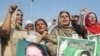 Supporters of Pakistan's former prime minister Nawaz Sharif celebrate the bail order of Sharif's daughter Maryam Nawaz in Lahore, Pakistan, Nov. 4, 2019. 