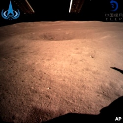 In this photo provided Jan. 3, 2019, by China National Space Administration via Xinhua News Agency, the first image of the moon's far side taken by China's Chang'e-4 probe. (China National Space Administration/Xinhua News Agency via AP)