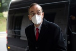 Syrian Constitutional Committee Co-Chair Hadi al-Bahra from the opposition, arrives for the fourth session of the committee at the European headquarters of the United Nations in Geneva, Switzerland, Nov. 30, 2020.