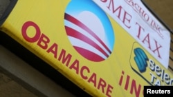 Le sigle d'Obamacare affiché sur la devanture d'un magasin d'assurance à San Ysidro, San Diego, Californie, aux États-Unis, le 26 octobre 2017.