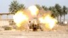 Iraqi security forces fire cannon during clashes with al Qaeda-linked Islamic State in Iraq and the Levant (ISIL), Jurf al-Sakhar, south of Baghdad, March 19, 2014.