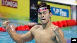 孙杨2017年7月25日在布达佩斯举行的国际泳联游泳世锦赛男子200米自由泳决赛中夺冠。（资料照片）