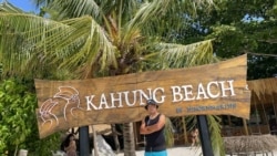 FRENCH TOURIST TOUA YANG POSES ON KOH HE IN PHUKET (Photo credit: TOUA YANG)