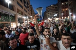 Protesters take a part in a peaceful march in Yerevan, Armenia, July 18, 2016.