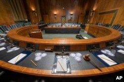 The Senate Judiciary Committee hearing room is prepared for Attorney General William Barr who will face lawmakers' questions Wednesday for the first time since releasing special counsel Robert Mueller's Russia report, on Capitol Hill in Washington, April 30, 2019.