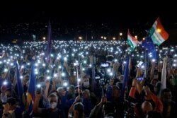 People take part in a protest for media freedom in Budapest, Hungary, July 24, 2020.