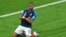 FILE - France's Kylian Mbappe celebrates after scoring a goal during the World Cup game against Argentina in Kazan, Russia, June 30, 2018.