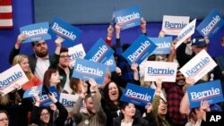 Supporters cheer during a election night rally for Democratic presidential candidate Sen. Bernie Sanders, I-Vt., in Manchester, N.H., Feb. 11, 2020. 