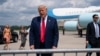 President Donald Trump talks to a crowd of supporters after arriving at Wilmington International Airport, Sept. 2, 2020, in Wilmington, N.C. 
