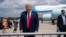 President Donald Trump talks to a crowd of supporters after arriving at Wilmington International Airport, Sept. 2, 2020, in Wilmington, N.C. 