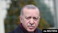 Turkish President Recep Tayyip Erdogan addresses the media after the Friday prayers in Istanbul, Turkey, March 12, 2021. (Presidential Press Office/Handout via Reuters) 